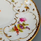 Elegante Nymphenburg Tasse mit Untertasse – Handbemaltes Porzellan