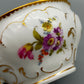 Elegante Nymphenburg Tasse mit Untertasse – Handbemaltes Porzellan