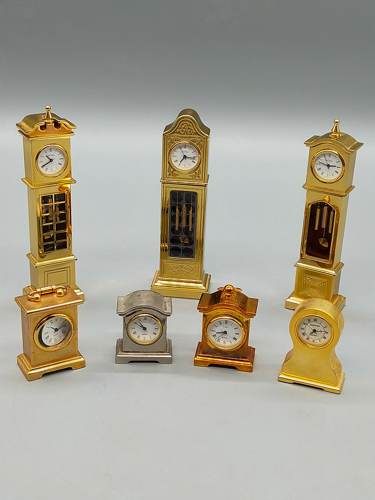 Du Château - Set aus 7 Miniatur Standuhren & Kaminuhren Messing