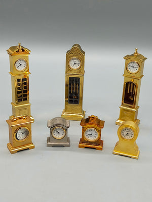 Du Château - Set aus 7 Miniatur Standuhren & Kaminuhren Messing