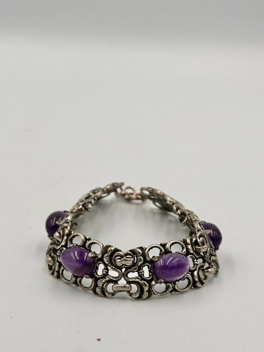 Elegantes Art Deco Armband mit violetten Steinen