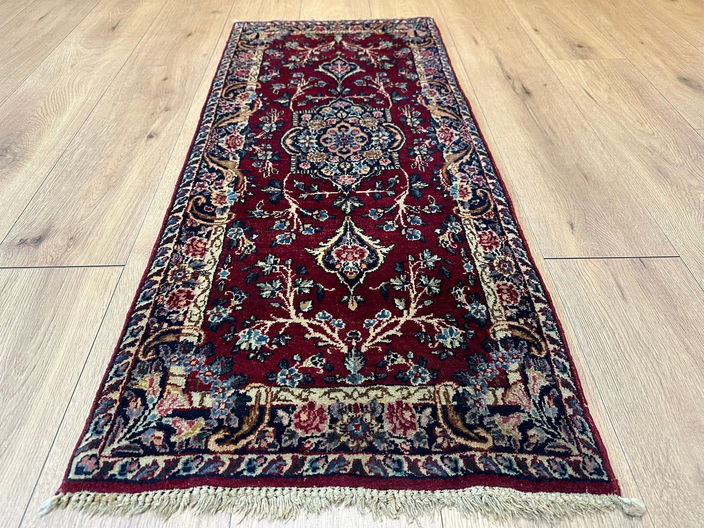 Orientteppich handgeknüpft 121x53 cm Kirman Louvre