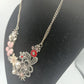 Romantische Statement-Kette mit Blumen und Perlen