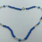 Blaue Perlenkette mit Glas-Elementen