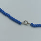 Blaue Perlenkette mit Glas-Elementen