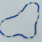 Blaue Perlenkette mit Glas-Elementen