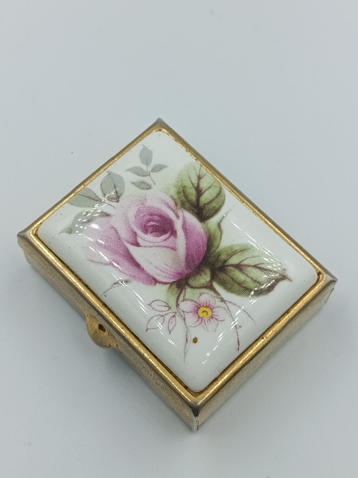 Rechteckige Pillendose mit Rosendekor