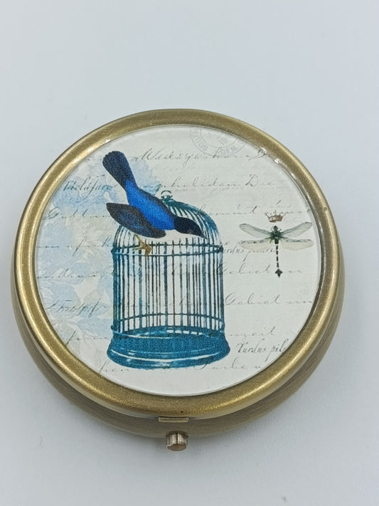 Runde Vintage-Dose mit Vogel- und Käfig-Motiv