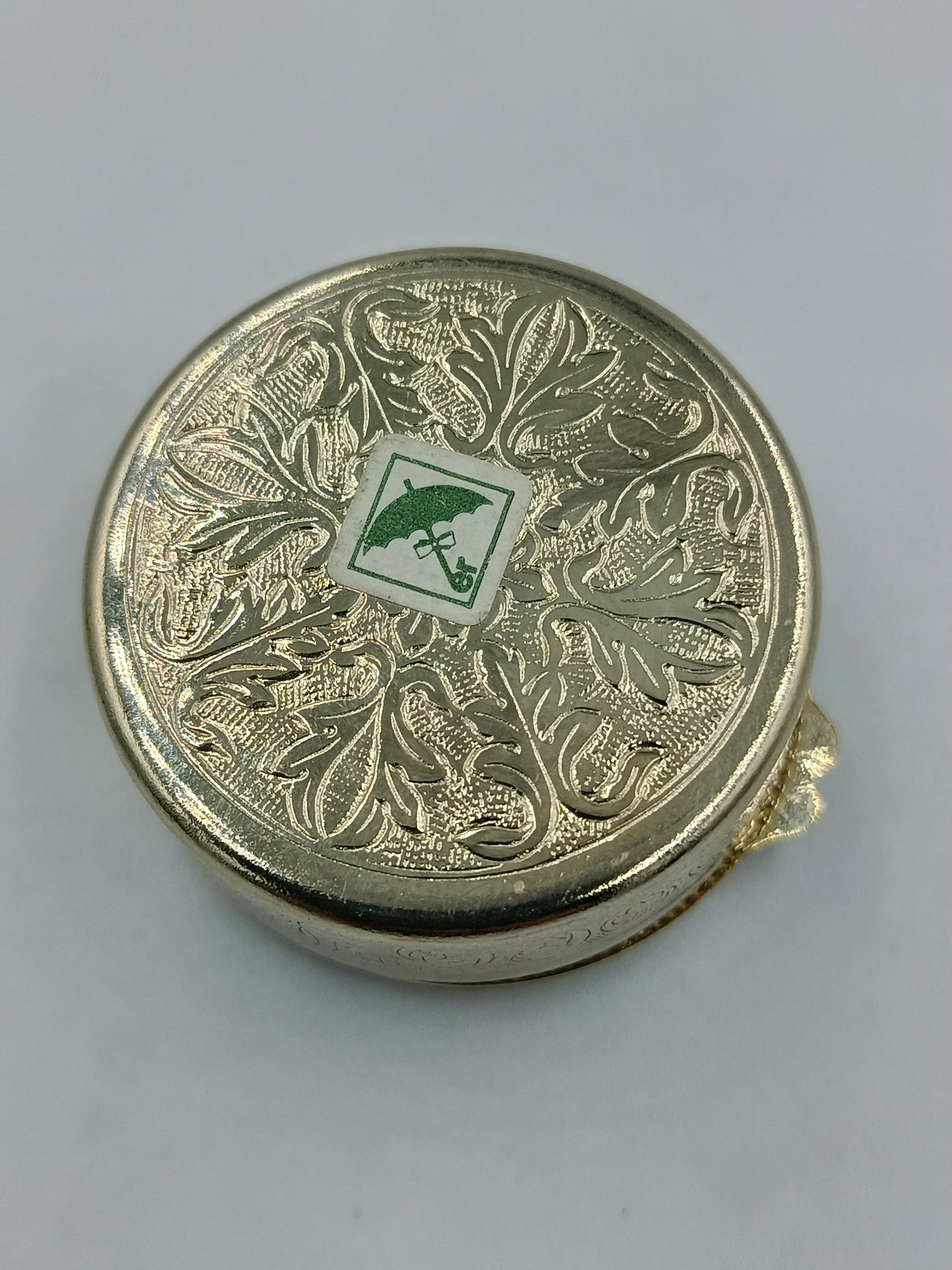 Runde Schmuckdose mit floraler Emaille