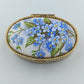 Ovale Porzellandose mit Vergissmeinnicht-Motiv
