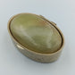Antike Pillendose mit grünem Steinbesatz
