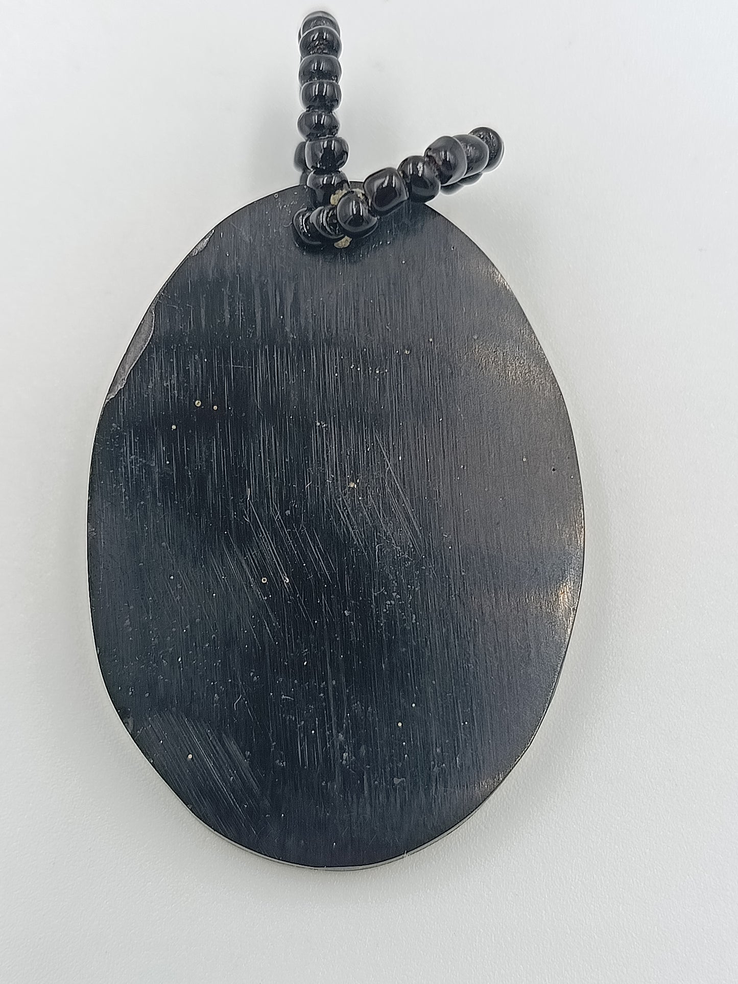 Ethno-Anhänger aus Perlmutt und Holz