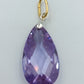 Facettierter Anhänger mit violettem Kristall