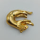 Vergoldete Panther-Brosche mit Strass und Rubinauge