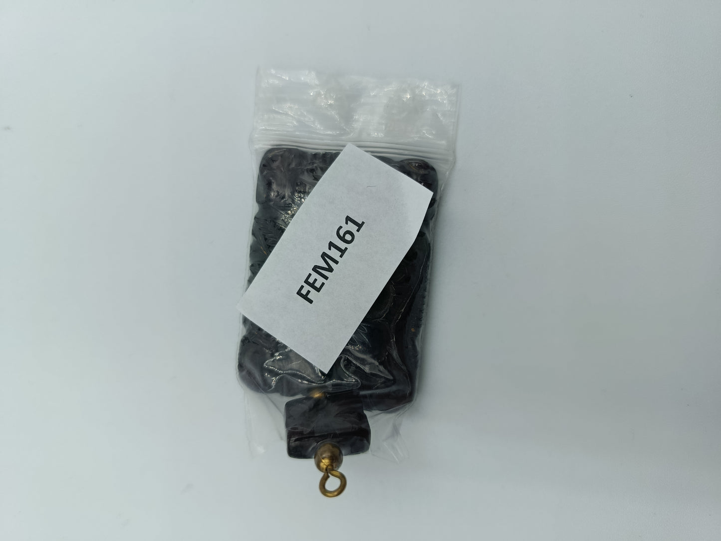 Antiker Bakelit-Anhänger mit Blumenmuster