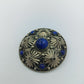 Vintage Filigran-Brosche mit blauen Cabochons