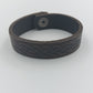 Dunkles Lederarmband mit keltischem Muster