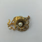 Goldfarbene Vintage-Brosche mit Perlenblüten