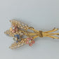 Goldfarbene Ähren-Brosche mit Emailblüten