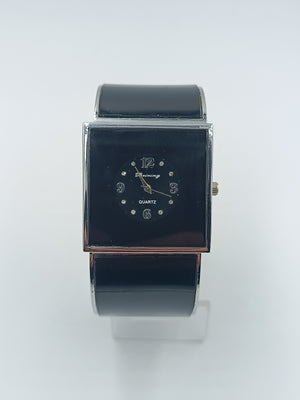 Elegante Armspange-Uhr in Schwarz und Silber