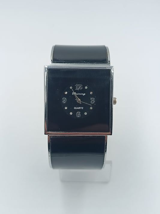 Elegante Armspange-Uhr in Schwarz und Silber