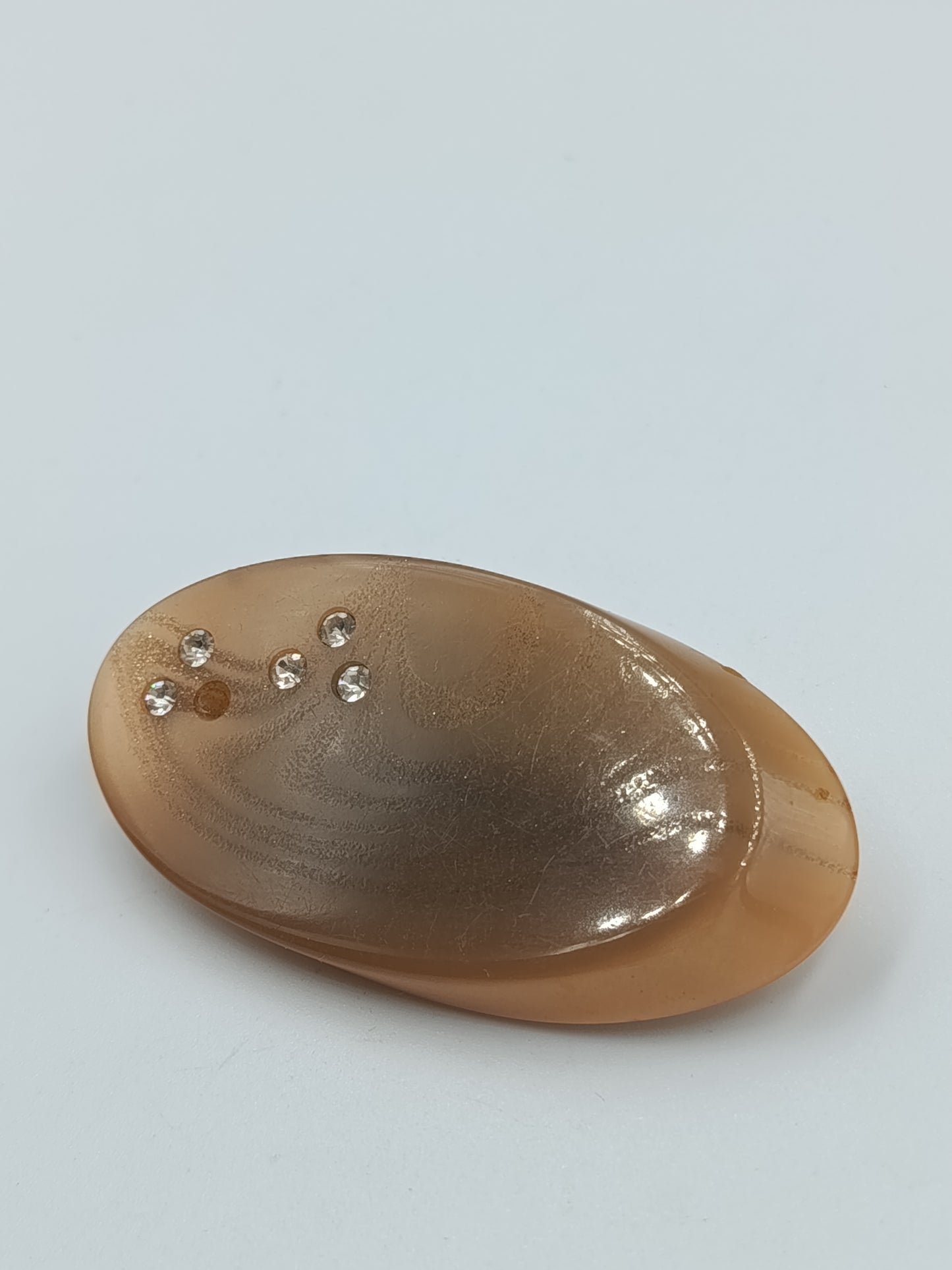Elegante Haarspange in Bernsteinoptik mit Strass