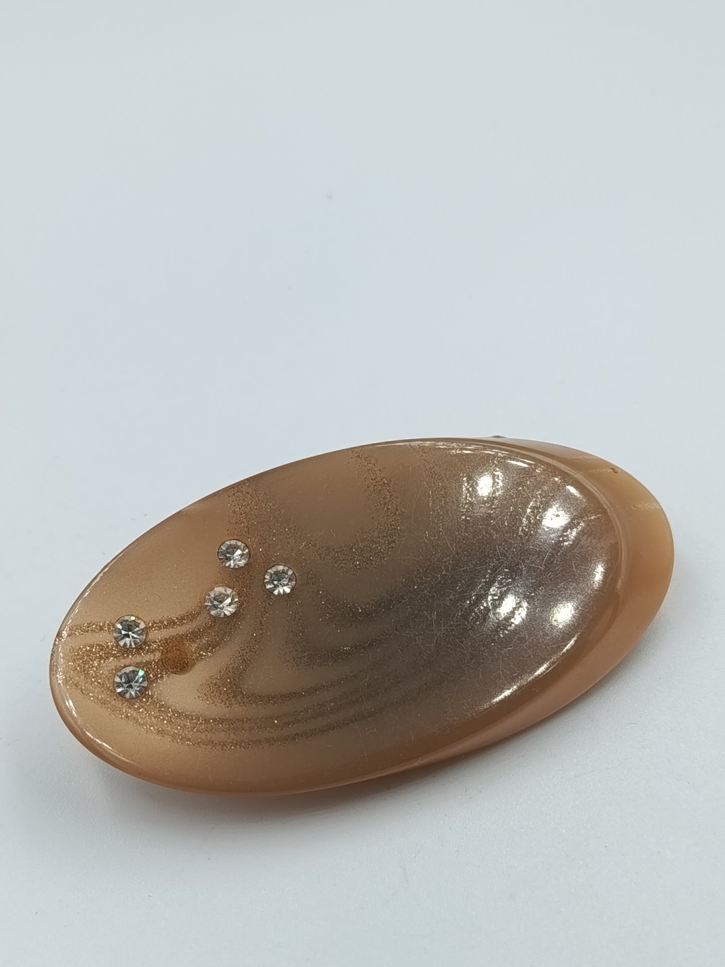 Elegante Haarspange in Bernsteinoptik mit Strass