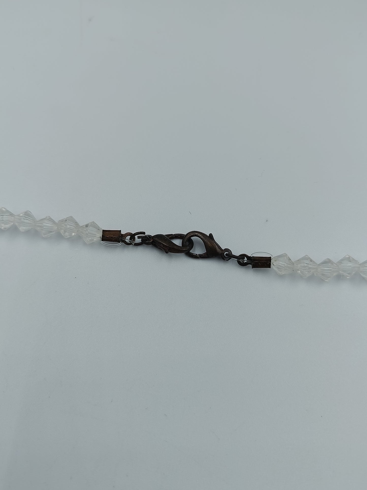 Elegante Glasperlenkette in Rauchgrau und Kristallklar