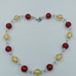 Glasperlenkette in Rot & Gold mit Silberdetails