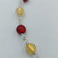 Glasperlenkette in Rot & Gold mit Silberdetails