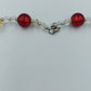 Glasperlenkette in Rot & Gold mit Silberdetails