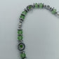 Halskette mit grünen Glasperlen & Metall-Elementen