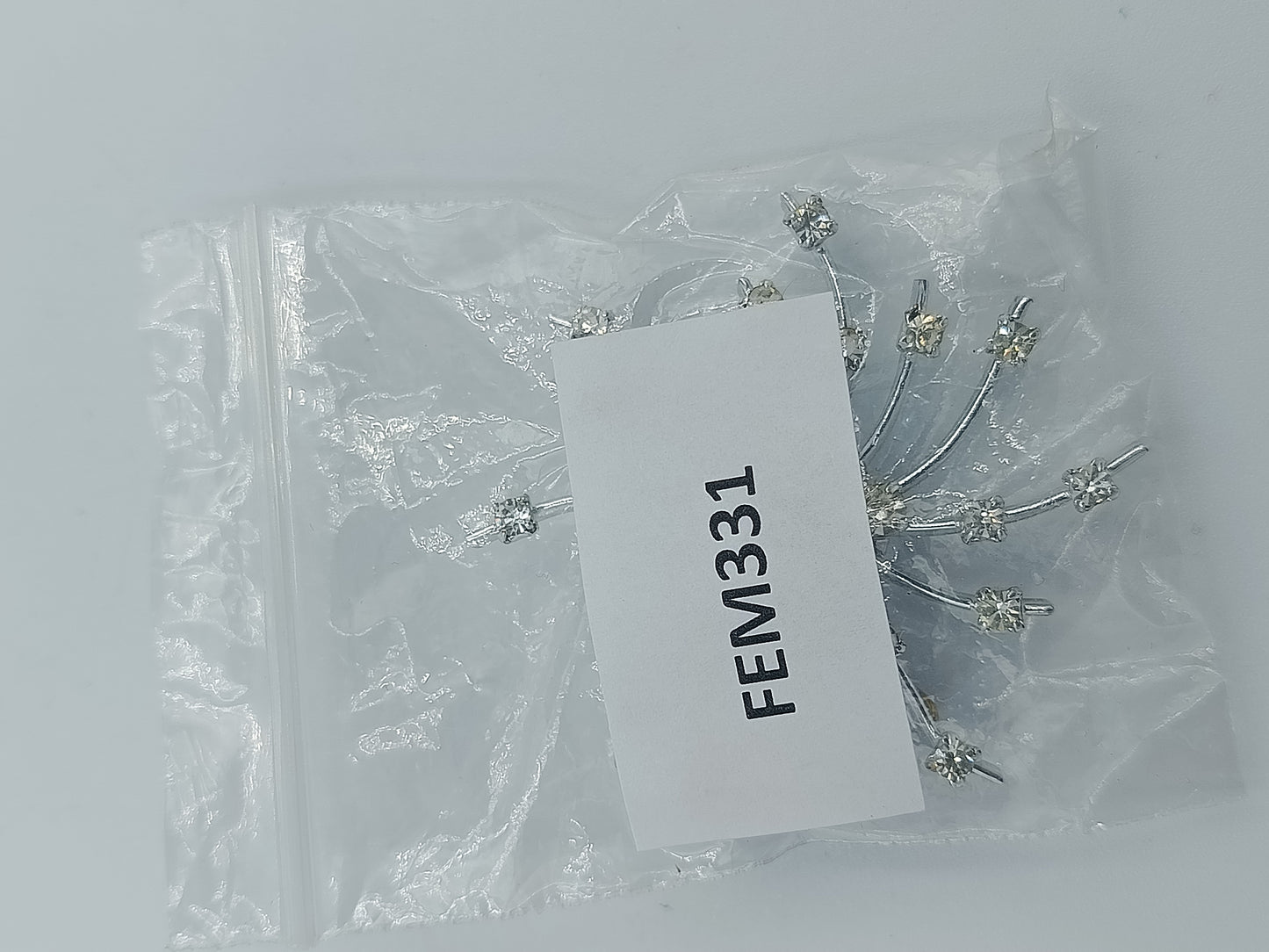 Strahlenförmige Vintage-Brosche in Silberoptik mit Strass