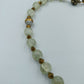 Glasperlenkette in Grün-Gold mit Strassverschluss