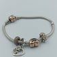 Pandora Armband mit Charms in Silber & Roségoldoptik