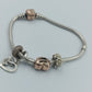 Pandora Armband mit Charms in Silber & Roségoldoptik
