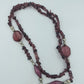 Lange Halskette in Violett mit Glassteinen & Silberdetails