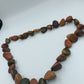 Naturholz-Halskette in warmen Erdtönen