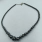 Halskette aus Hämatit-Perlen in Verlaufoptik