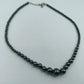Halskette aus Hämatit-Perlen in Verlaufoptik