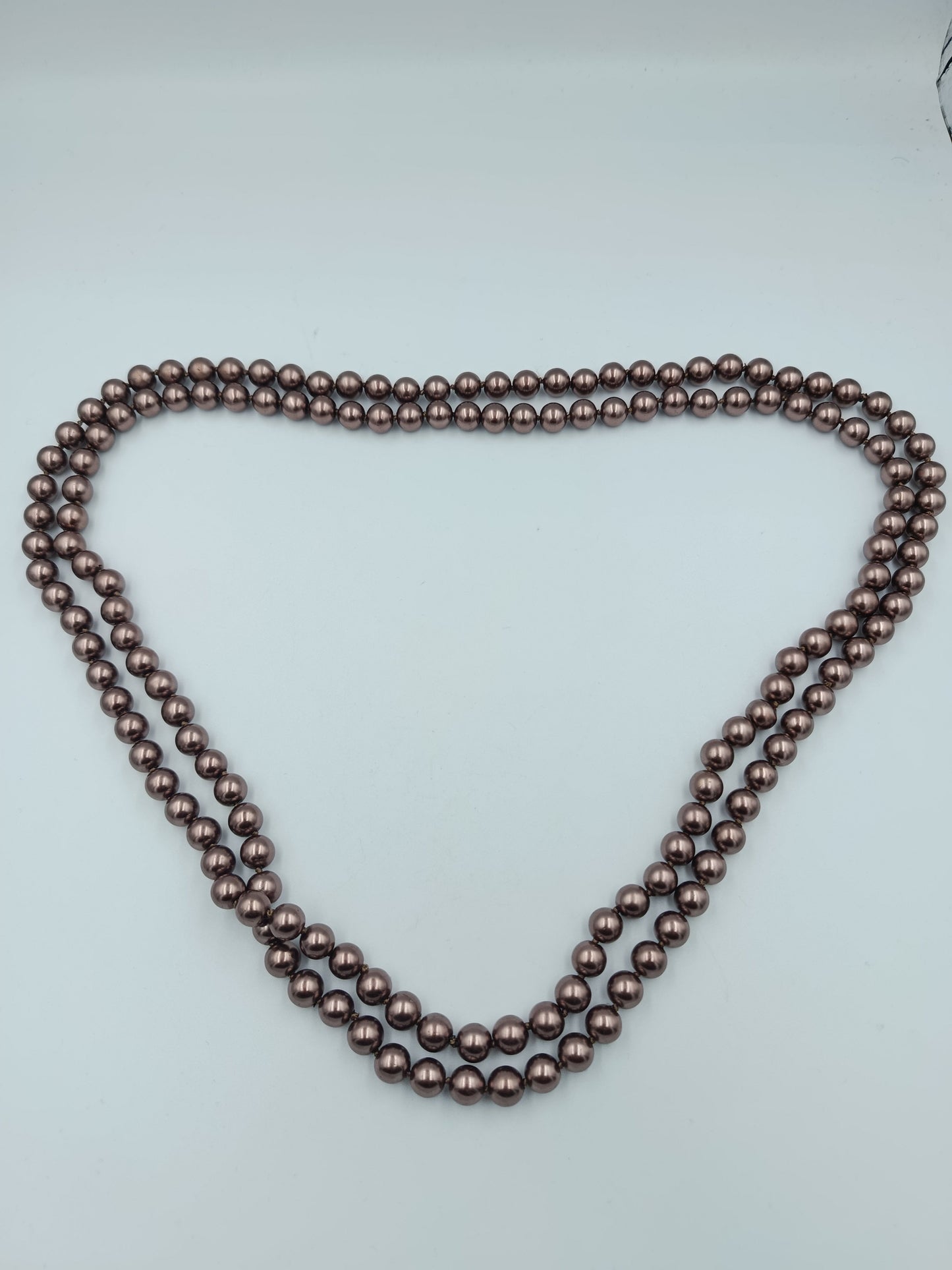 Elegante lange Perlenkette in Schokobraun