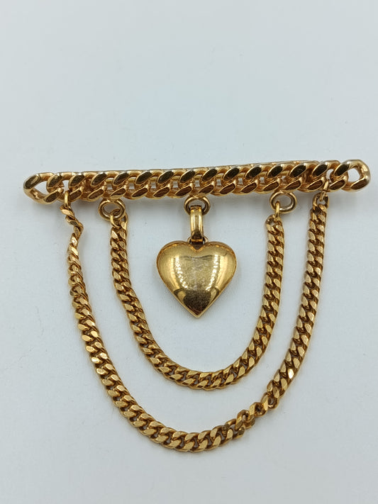 Goldfarbene Brosche mit Herz-Anhänger und Kettendetails