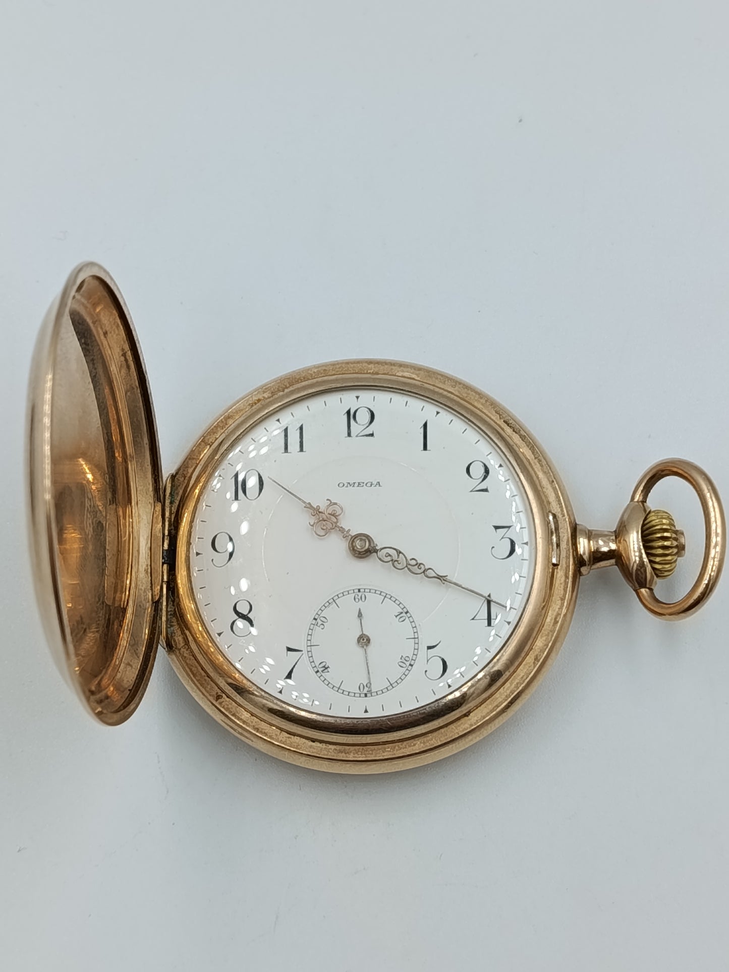 Antike Omega Savonnette-Taschenuhr in Goldoptik (defekt)