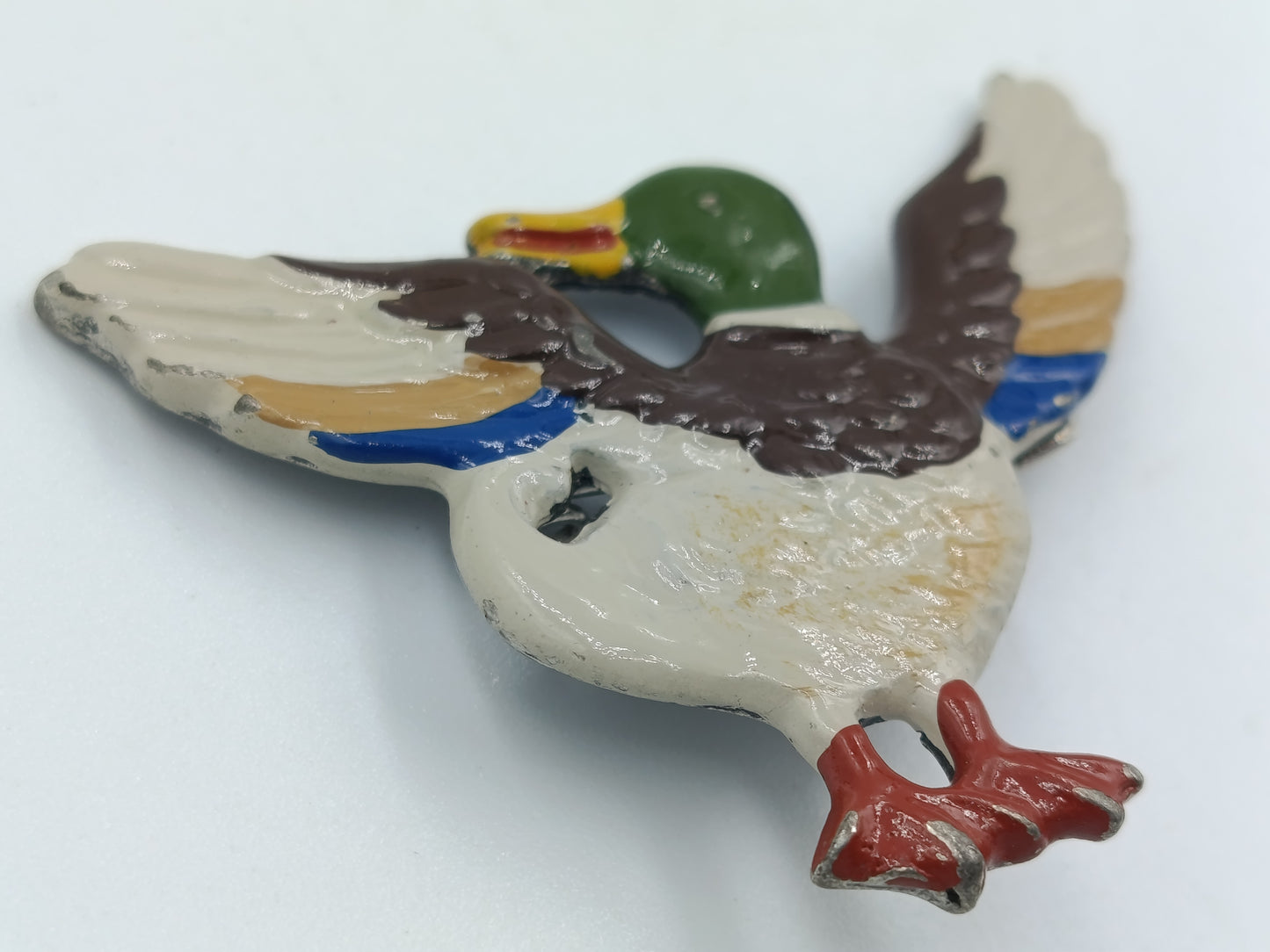 Emaille-Brosche „Fliegende Ente“