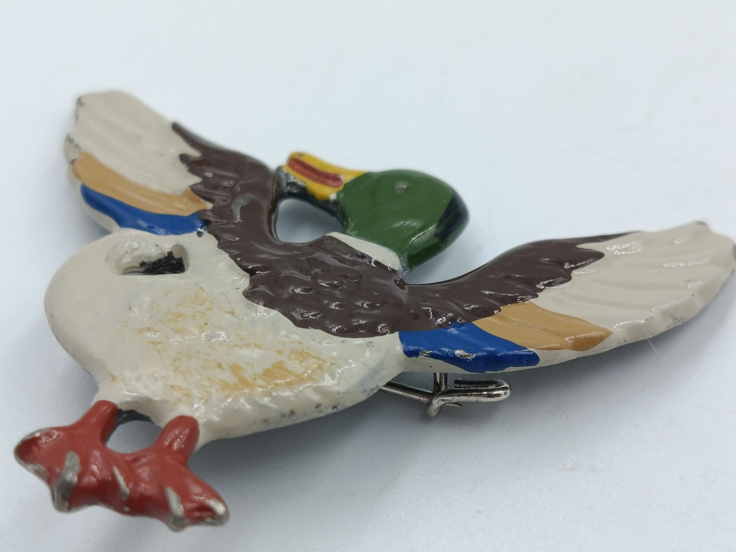 Emaille-Brosche „Fliegende Ente“