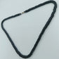 Schwarze Glasperlenkette im Twist-Design