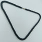 Schwarze Glasperlenkette im Twist-Design