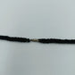 Schwarze Glasperlenkette im Twist-Design