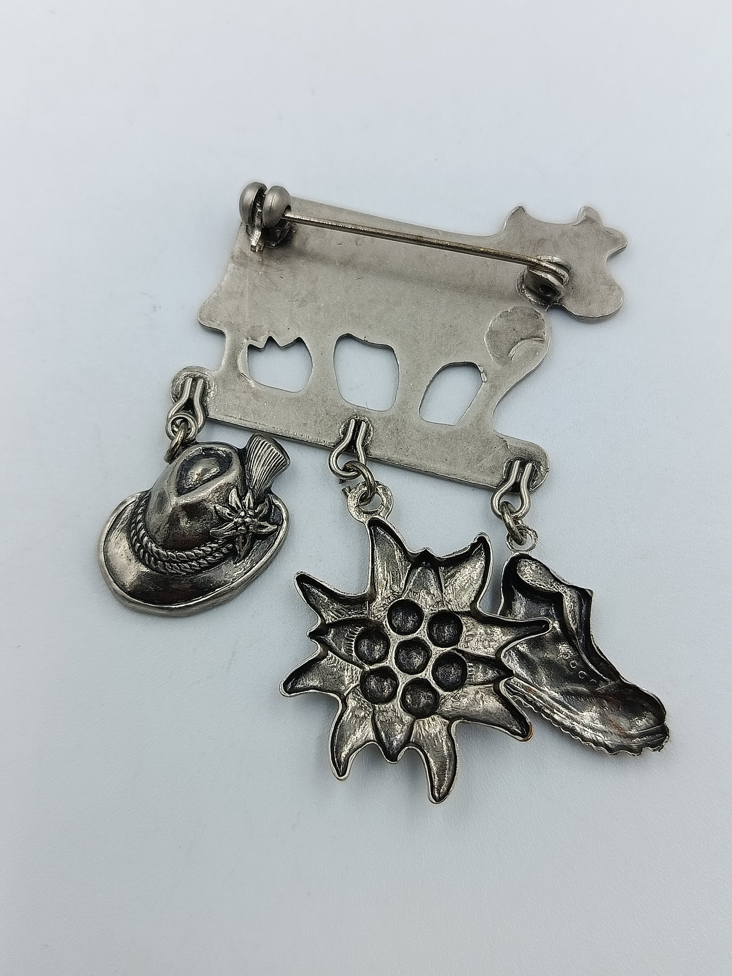 Trachtenbrosche „Kuh mit Anhängern“