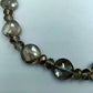 Glasperlenkette in Rauchgrau, facettiert